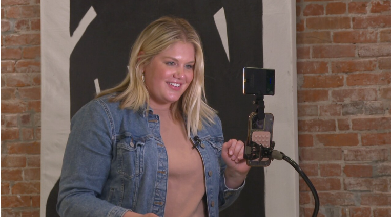 Rachel Kilmer, a Kansas City-area real estate agent, engaging with her audience during a TikTok video recording session.